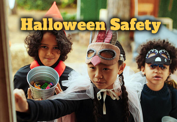 Kids in Halloween Costumers Trick or Treating
