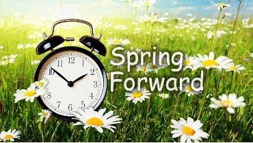 Spring Forward with a clock in the distance.