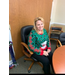 Staff member with holiday sweater