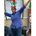 Staff member in holiday reindeer antlers